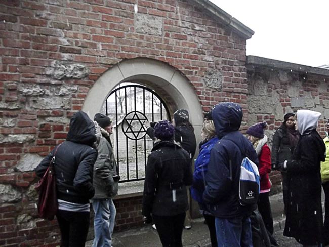 2013 Study Abroad students at cemetery in Kraków